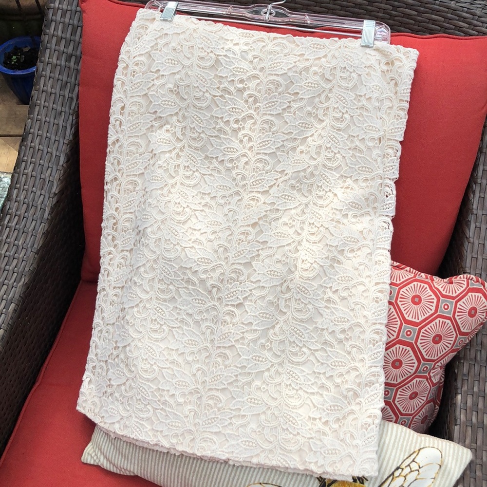 NEVER WORN! Cream cut out skirt. Summer is around the corner! Fresh looking!